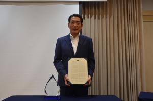 Governor Tokihiro Nakamura of Ehime Prefecture with the proclamation.